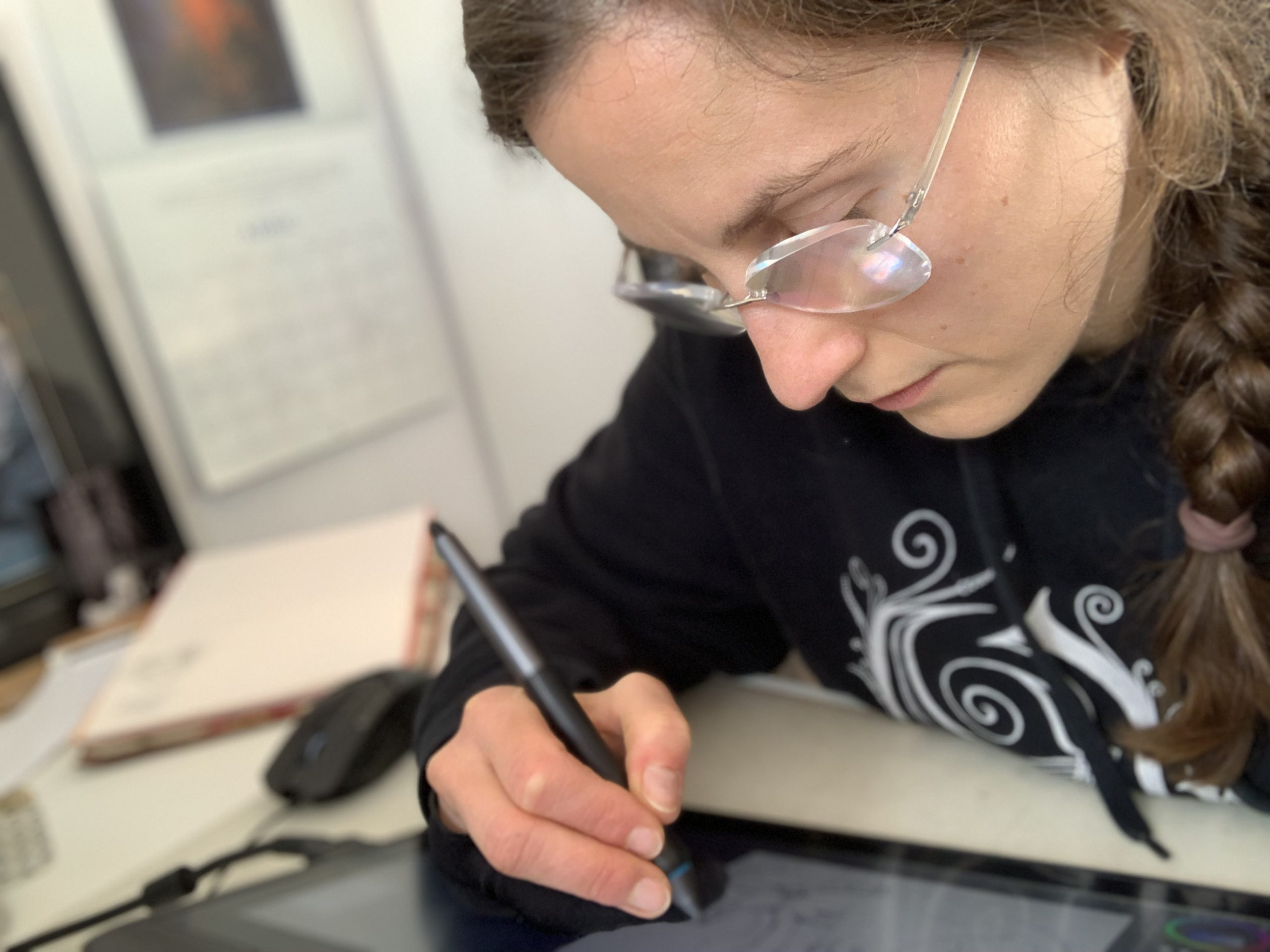 Natalia Salvador working with her drawing tablet